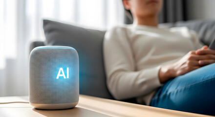 Woman relaxing on sofa while smart speaker with ai text displays on table at home. Artificial intelligence technology for modern living.