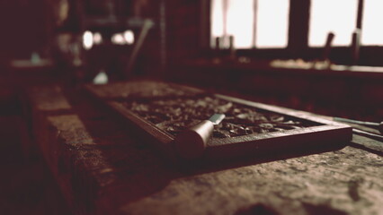 A skilled artisans chisel lies on a beautifully carved wooden workpiece in a warm, inviting workshop. Sunlight filters through the windows, illuminating the intricate details of the craft.