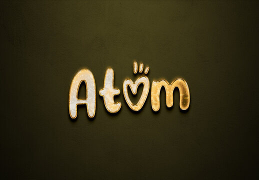 Old gold text effect of word Atom with 3D glossy style Mockup.	