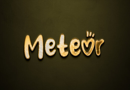Old gold text effect of word Meteor with 3D glossy style Mockup.	