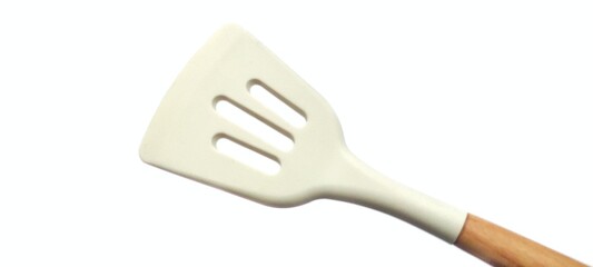 White Silicone Slotted Spatula with Wooden Handle. Cooking Preparation. Isolated on White Background