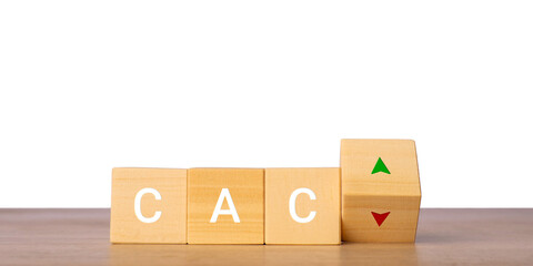 Wooden blocks with CAC letters and up down arrows for customer acquisition cost metric, isolated on transparent background