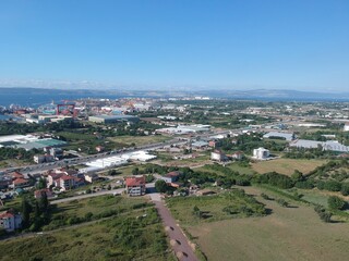 
Aerial drone view over Yalova, Turkey, showcasing natural landscapes transitioning from lush greenery to mountain scenery, with a glimpse of Koru Köy village. Scenic nature, coastal environment, and 