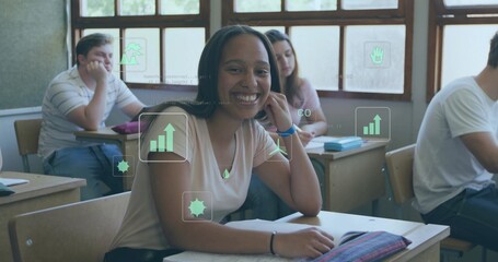 Smiling teen wearing light pink top, leaning on left hand at front desk with notebook, HUD