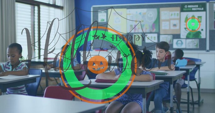 Sitting group of students writing at desks with papers in classroom, with Halloween overlay graphic - Powered by Adobe