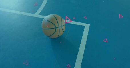 Naklejka premium Resting orange basketball on outdoor blue court by white line, casting shadow with pink triangles