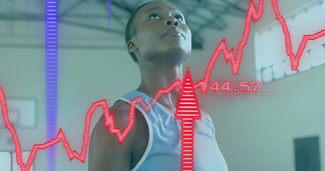 Looking woman athlete wearing light sleeveless top looking up in gym, hoop and HUD 44