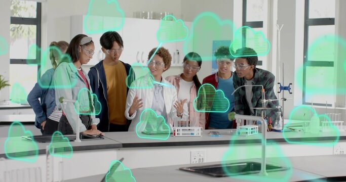 Demonstrating lab-coated teacher wearing goggles guiding group at school lab with neon cloud icons