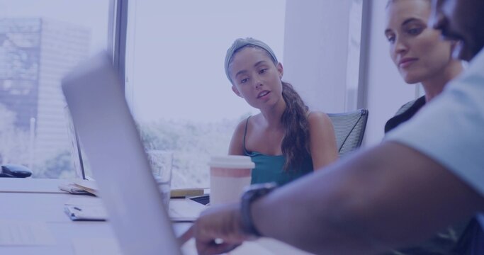 Leaning centered woman with headband and sleeveless top viewing laptop in meeting room, with coffee - Powered by Adobe