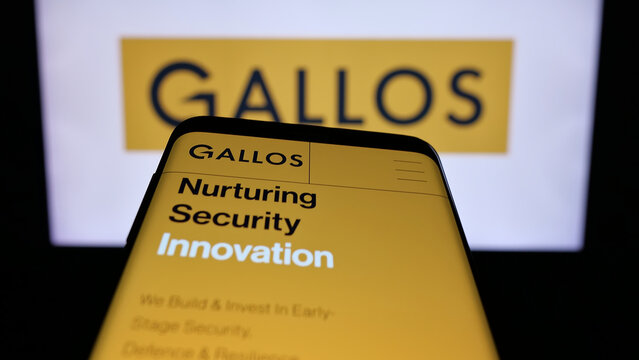 Stuttgart, Germany - 11-24-2025: Mobile phone with website of British company Gallos Technologies Ltd. on screen in front of logo. Focus on top-left of phone display.