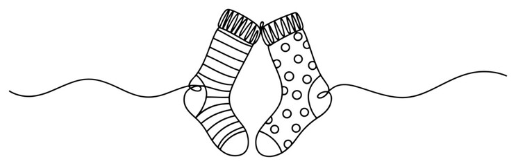 Continuous one line drawing of cute hanging socks pair with stripes and dots patterns for laundry or winter design