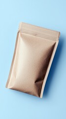 A brown paper pouch on a light blue background, studio shot. The pouch is angled slightly and has a sealed top.