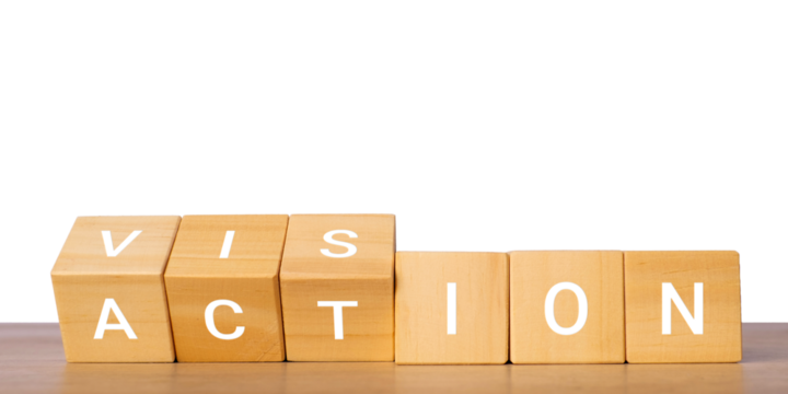 Wooden blocks with vision and action text for strategy execution concept, isolated on transparent background