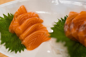 Fresh salmon sashimi on white plate. Seafood healthy organic