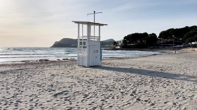 Paguera beach with strong wind , high Waves and Surfer, Calvia, Mallorca, Spain