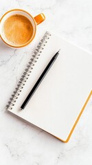 A top-down shot of a cup of coffee, a notebook, and a pen on a marble surface. The composition creates a sense of calm and focus.