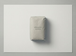 Package of organic flour displayed on a clean white surface, emphasizing simplicity and natural ingredients, perfect for culinary creations and healthy baking