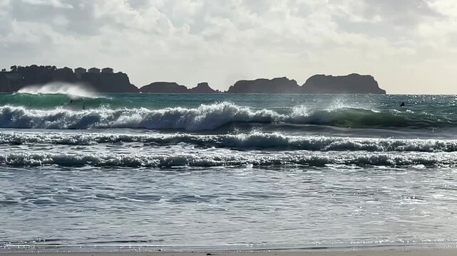 Paguera beach with strong wind , high Waves and Surfer, Calvia, Mallorca, Spain