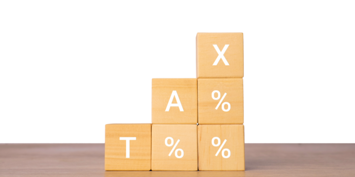 Wooden blocks with tax percentage text for increasing tax rate concept, isolated on transparent background