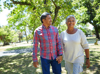 Holding hands, smile and love with old couple in park for connection, bonding and retirement. Support, marriage milestone and commitment with senior man and woman outdoor for trust and getaway