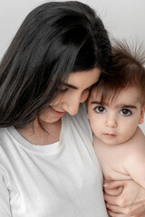 close-up of a mother and baby, portrait of a mother holding a baby