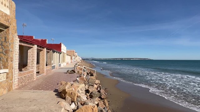 seafront houses on Babilonia beach in Guardamar del Segura, Alicante, Spain