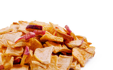 Healthy snack of crunchy apple chips in a tasty pile on a clean background