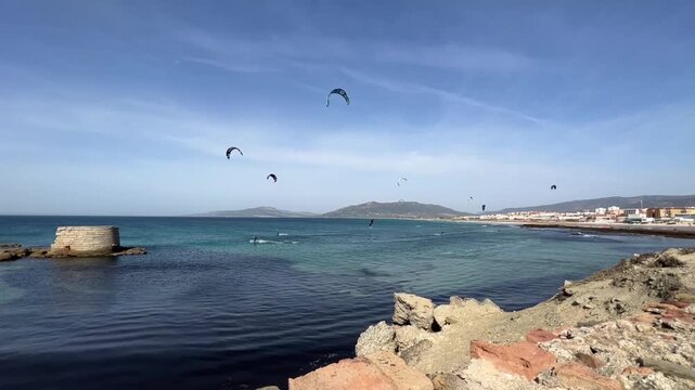 Kite surfing around Isla de Tarifa in Spain