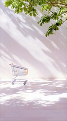 A shopping cart on a patio with a white wall and tree shadows, illuminated by sunlight.