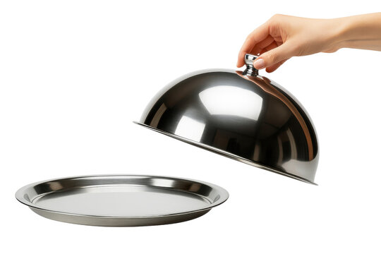 Hand lifting silver serving cloche dome cover off empty metal platter isolated on white