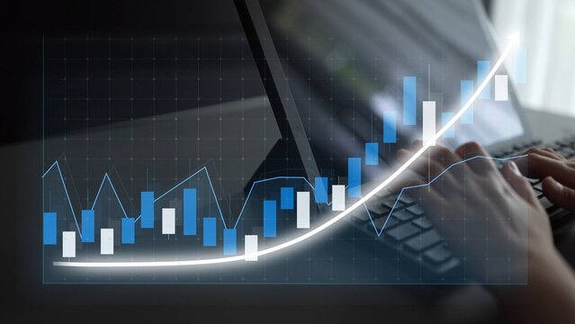 A person types on a laptop keyboard with a stock market graph displayed, representing growth in financial data and analysis for traders and investors. Copula - Powered by Adobe