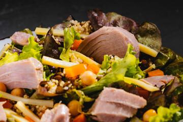 Bowl of salad with tuna steak