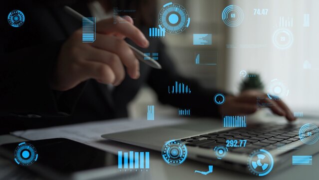 A businessman engages in data analysis using a laptop, surrounded by a digital interface of graphs and charts. The modern office setting enhances productivity and focus. Xenic
