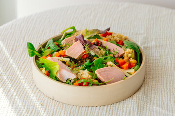 Bowl of salad with tuna steak