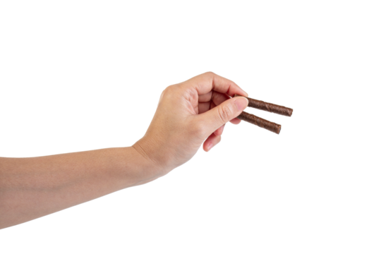Chocolate bar in hand on transparent background