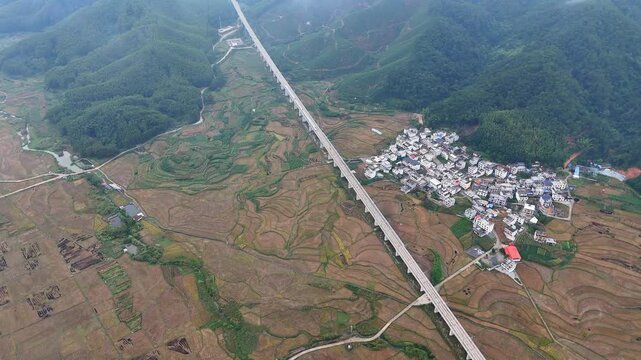High-Speed Railway Crossing Misty Karst Basin with Villages, Guangxi