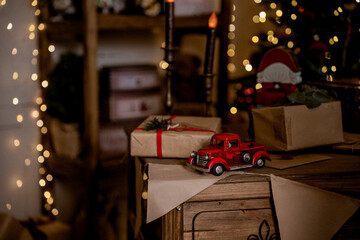 Festive New Year's begraunt red car pickup and gift wrapping, Gift delivery to children for the...