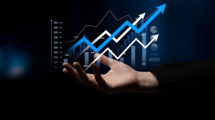 A hand reaching out toward a digital display showcasing various upward-trending graphs and arrows, symbolizing growth and success in finance and investment. Scalp