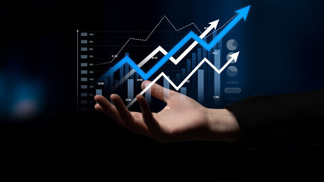 A hand reaching out toward a digital display showcasing various upward-trending graphs and arrows, symbolizing growth and success in finance and investment. Scalp