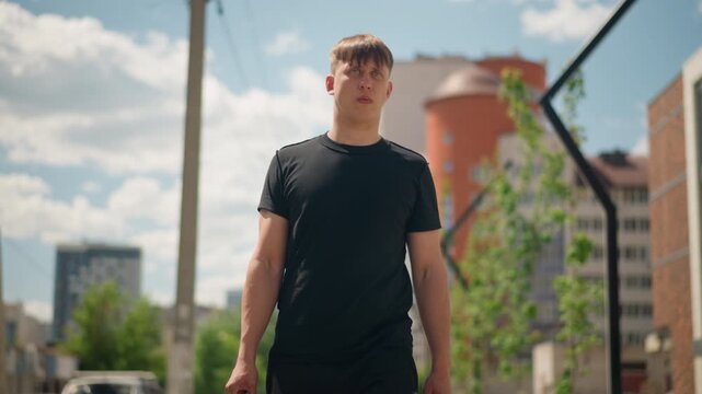 young urban professional, determined young startup founder walks toward business meeting outdoors, brighteyed young entrepreneur navigates bustling city sidewalks en route to important meeting