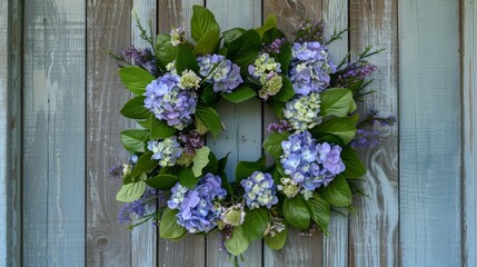 A beautiful fresh hydrangea wreath with purple flowers on a rustic wood door