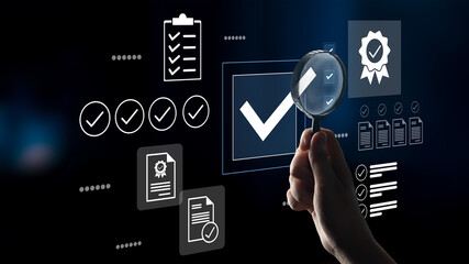 A hand holding a magnifying glass examines checkmarks and certification icons on a sleek digital...