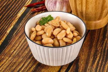 Baked white canned beans in the bowl