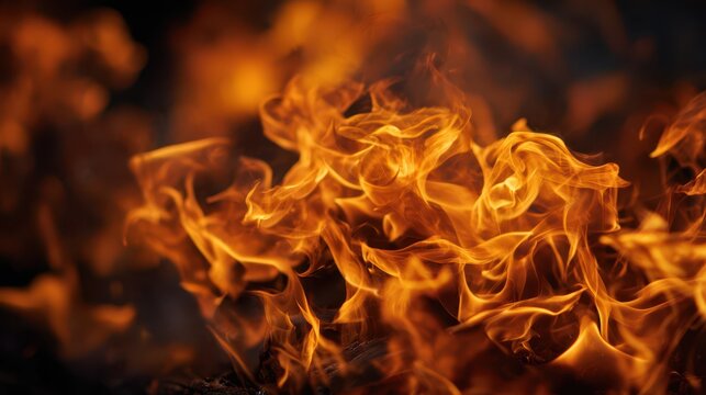 Macro fire texture: intense blaze with flowing tongues of flame for cinematic backdrop