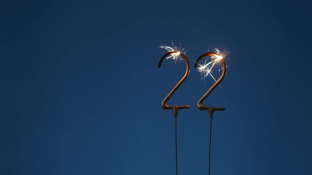 22 years celebration festive background made with Bengal fires in the form of number Twenty-two.