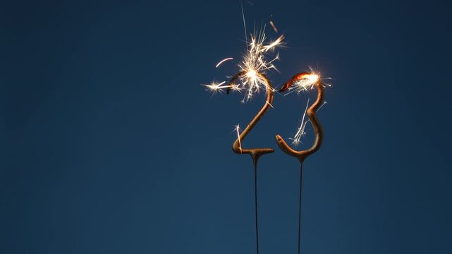 23 years celebration festive background made with Bengal fires in the form of number Twenty-three.