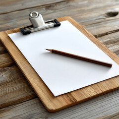 Clipboard with blank paper and pencil on wooden desk.