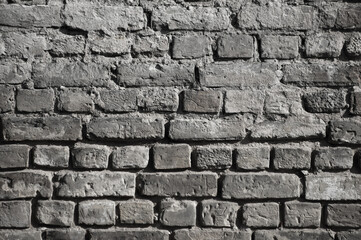 gray background, in the photo the texture of an old brick wall