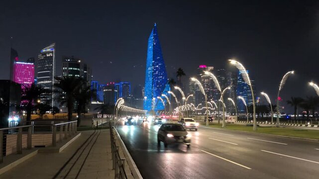 Doha Cityscape and Traffic on Corniche Road at Night - Qatar Urban Life