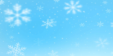 Blue Christmas background with falling snowflakes, a festive winter season design for holiday celebration